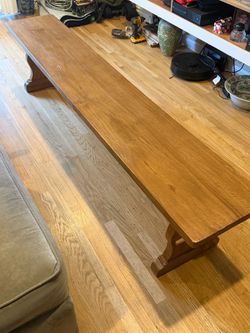 Long Wooden Bench with Trestle Base