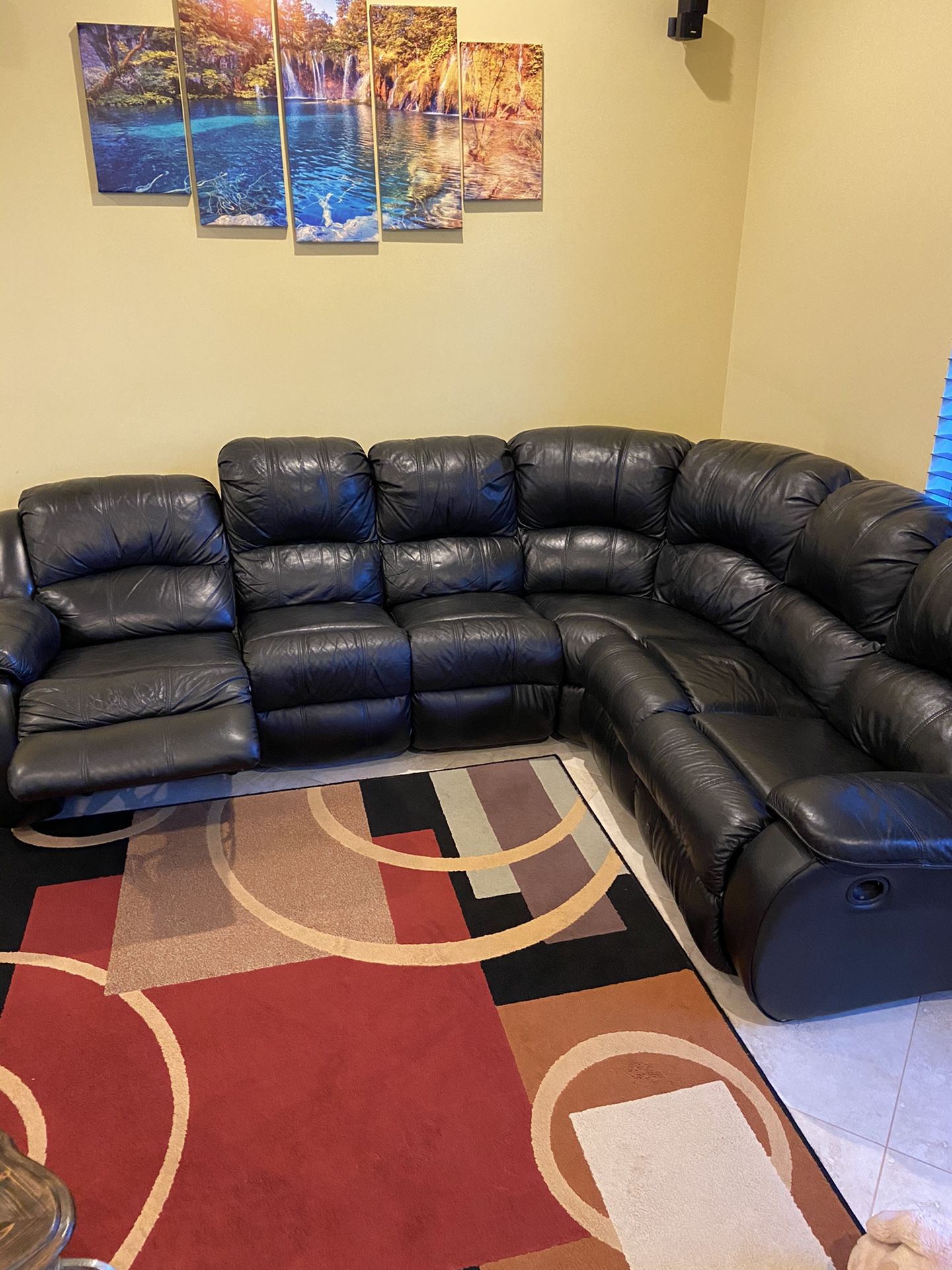 Sectional couch recliner
