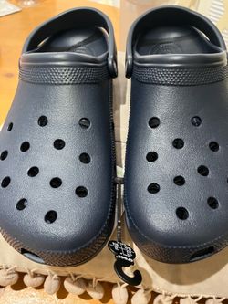 Brand new black Crocs Classic Clogs in men’s size 15.