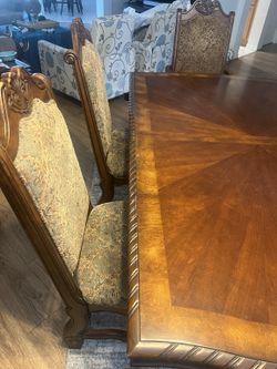 Elegant Dining Table + 6 Upholstered Chairs & 2 Extension Leaves — Seats Up to 10