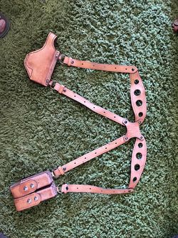 Leathers.   Two belts and a shoulder harnesses.