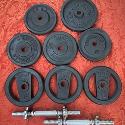 ADJUSTABLE DUMBBELLS  (8) 10 LB. STANDARD PLATES = 80 LBS. PLUS 2 HEAVY DUMBBELL HANDLE BARS