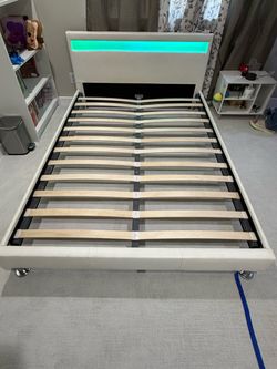 Full size bed with headboard lights