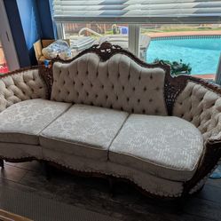 Vintage Carved Sofa & Glass‑Top Wooden Coffee Table - $300 for both (Pickup Only)