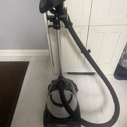Contain clothes steamer iron