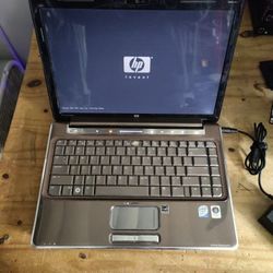 For Parts HP Pavilion DV4-1287CL 14.1" Laptop Intel Core 2 Duo T6400 @ 2.0 GHz 1 GB RAM No HDD No OS