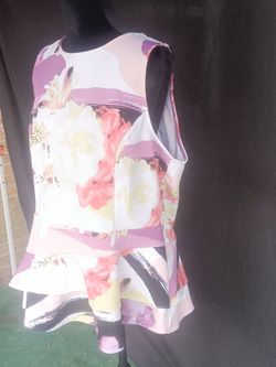 Floral Sleeveless Peplum Top