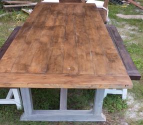 Table with (2) bench seats.