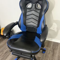 Gaming chair with foot rest