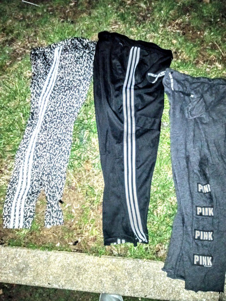 Nike And Adidas And Pink Sweatpants For Men And Women.