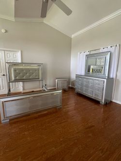 Bedroom set with LED in like-new condition with mirror, dresser, nightstand, and bed frame.