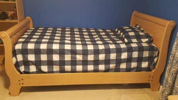 Twin size bed with spring mattress