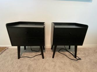 Two black wood nightstands