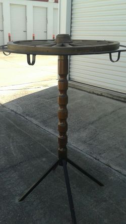 ANTIQUE WAGON WHEEL CLOTHES HOLDER