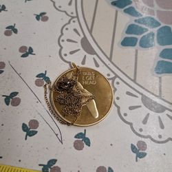 Tails and head medallion.