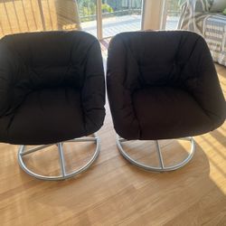 Two Swivel Chairs