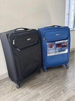 2 Samsonite Lift Two 25” Spinner check in luggage.