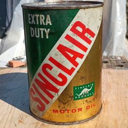 Vintage Sinclair cardboard oil can. Opened