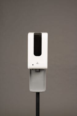 Touch-free sanitizer dispenser and stand combo