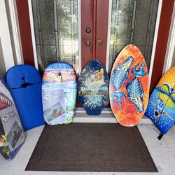 4 Boogie Boards, 2 Are Sealed In Package Unopened. 2 Skim Boards