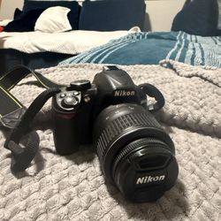 Nikon D3100 14.2MP Digital SLR Camera with 18-55mm f/3.5-5.6 Auto Focus-S DX VR Nikkor Zoom Lens