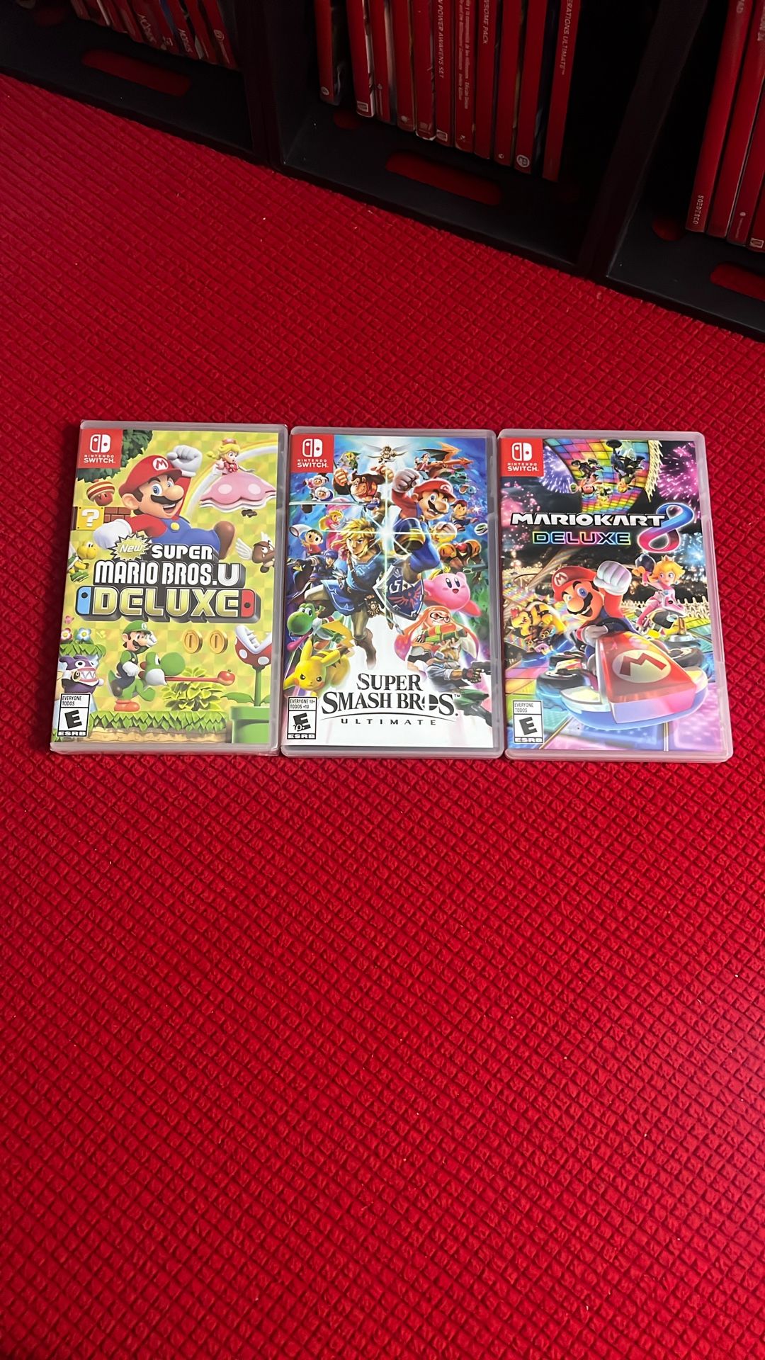 Nintendo Switch Games. Super Smash Bros Ultimate, Super Mario Bros U Deluxe, Mario Kart 8 Deluxe
