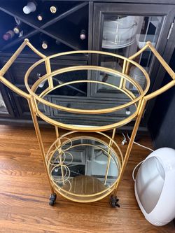 Gold mirror bar cart