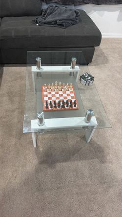 Multi layered glass coffee table
