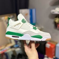 Green and white sports sneakers for ladies