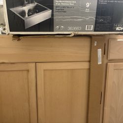 2 Cabinets And A Sink