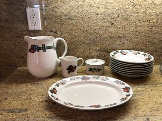 Pitcher And Set Of Plates