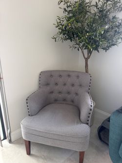 Gray Tufted Accent Chair with Nailhead Trim