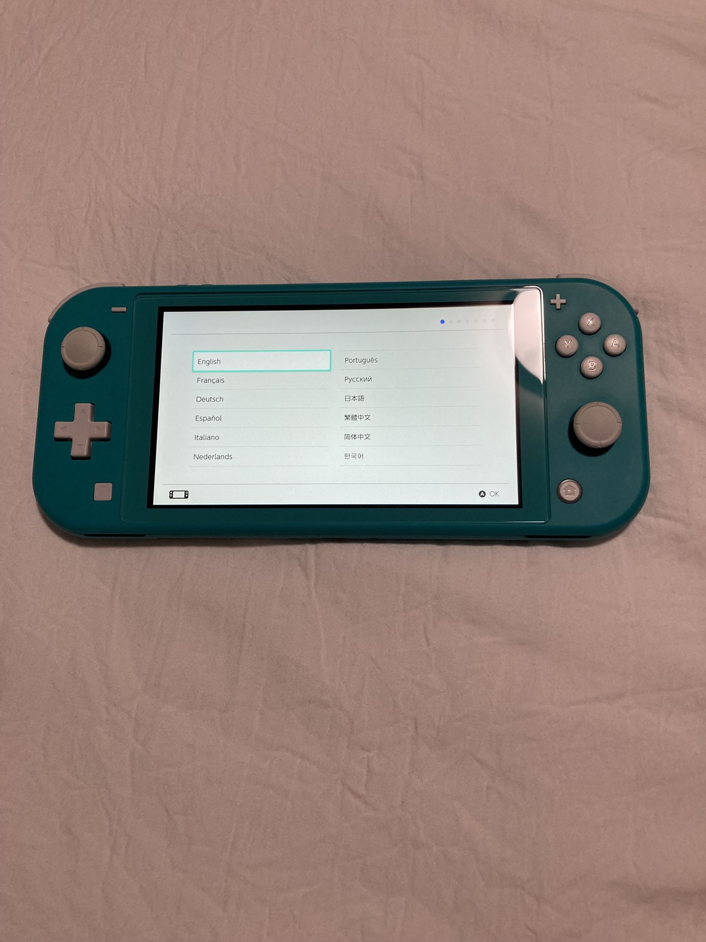 Nintendo Switch Lite + sd card + case