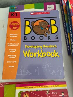 Kindergarten and some First grade level learning work books, writing paper flash cards