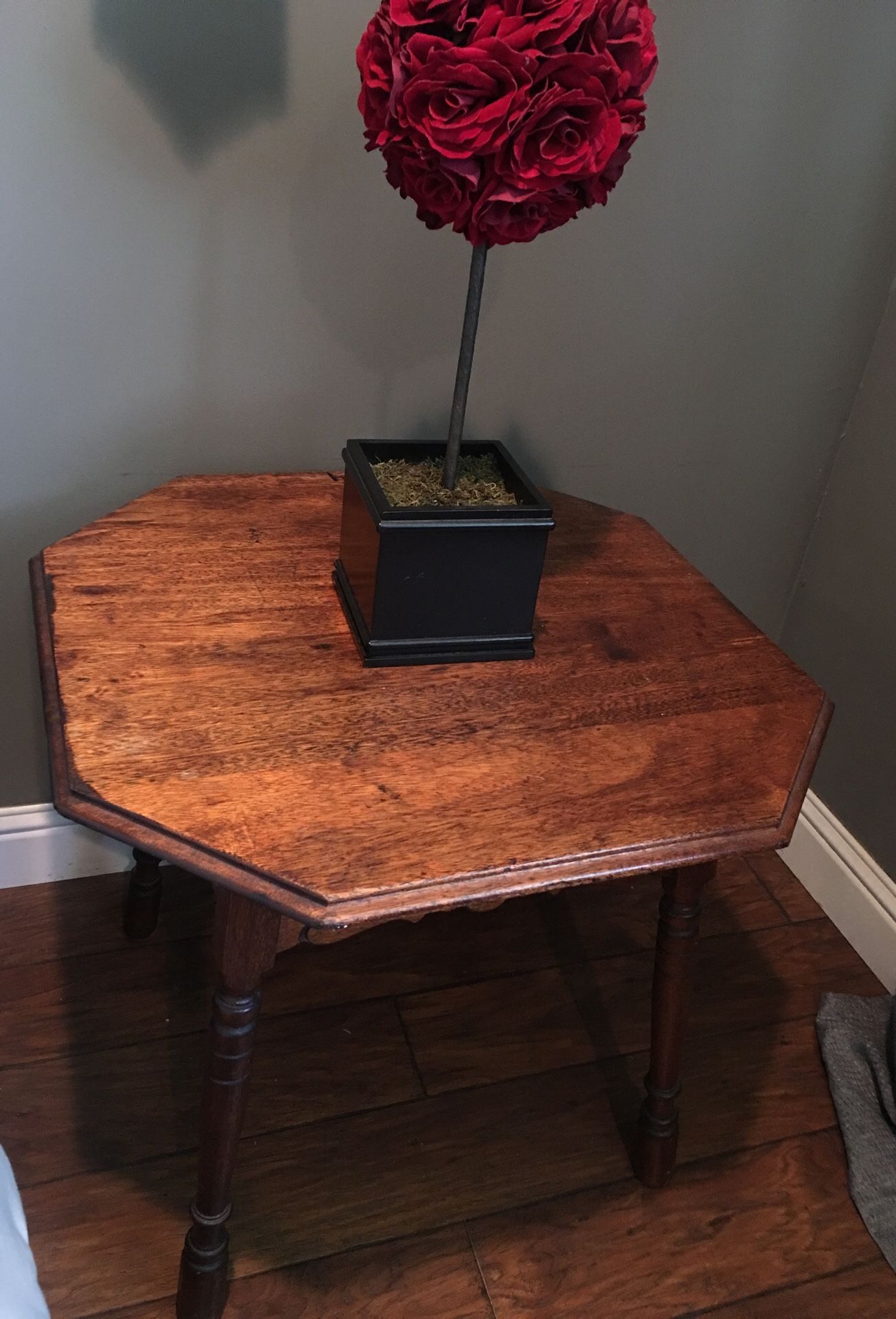Antique beside table .