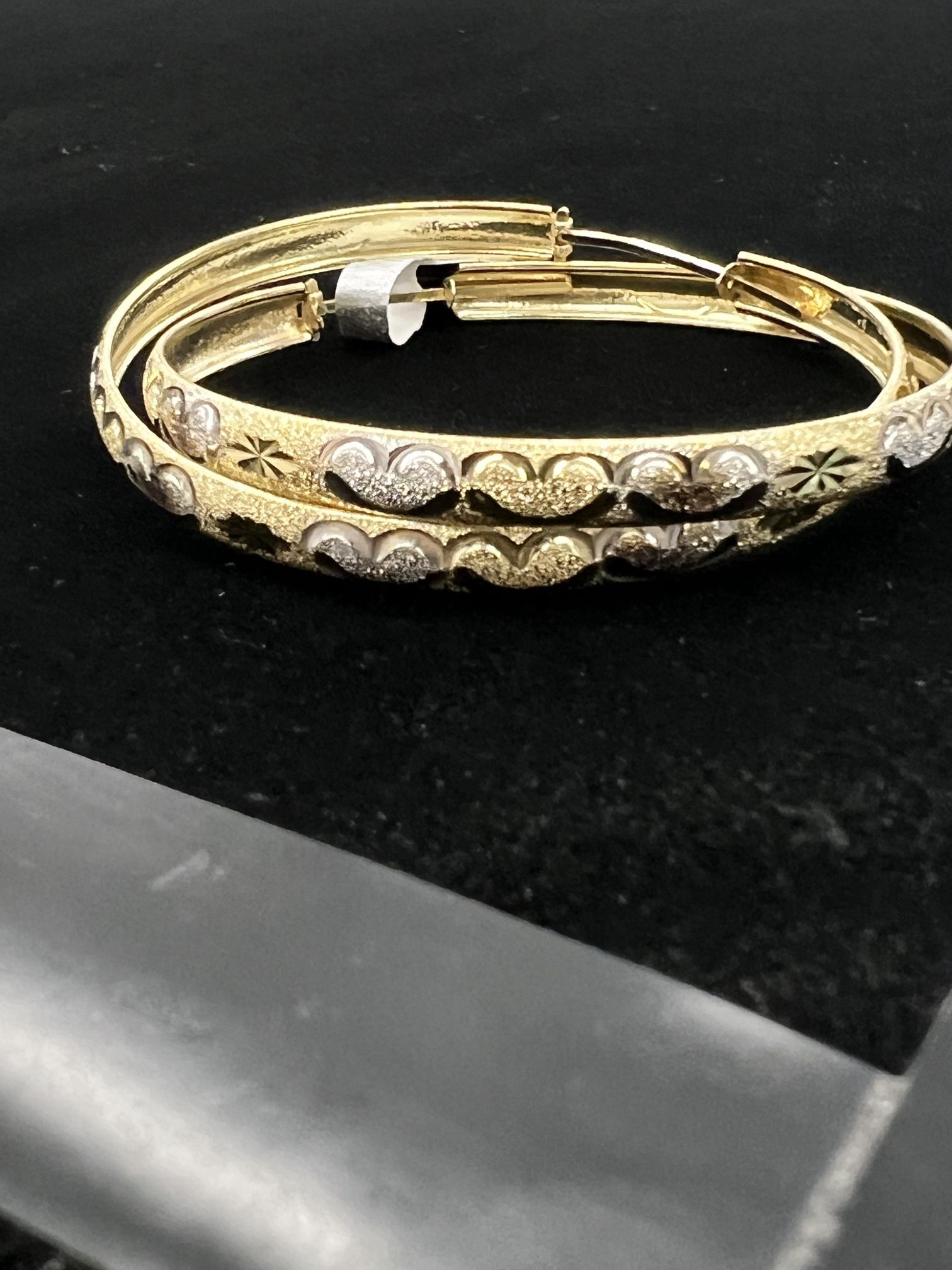 $650 Two Tone Gold Heart Hoop Earrings