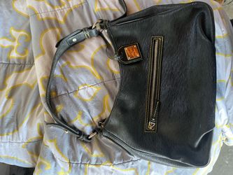 A dooney & Bourke purse 1975 need gone good condition