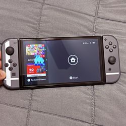 Nintendo Switch OLED - Super Smash Bros Bundle + Cases & Accessories