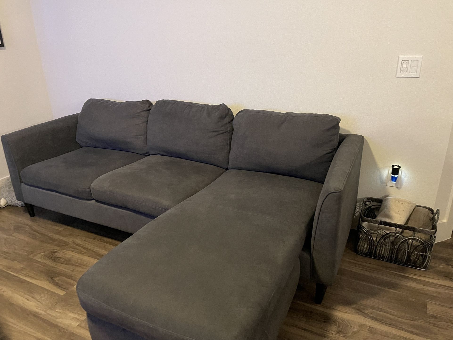 AYA GREY SOFA WITH REVERSIBLE CHAISE Living spaces