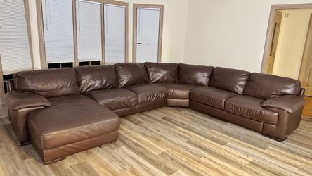 Leather sectional Sofa couch by Cindy Crawford.