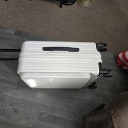 White suitcase.