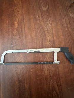 a adjustable hacksaw, a versatile tool often used for cutting metal or plastic.