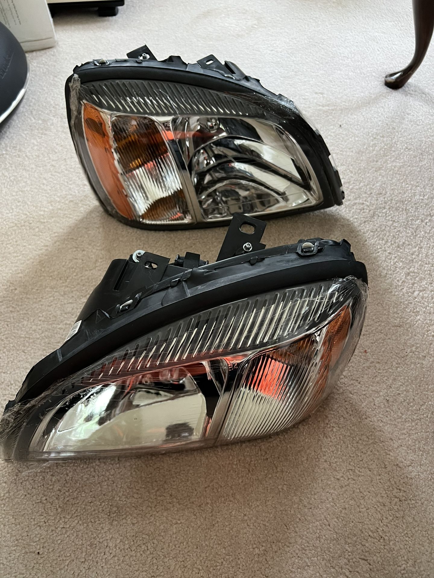 Headlights - LH/RH Cadillac DeVille