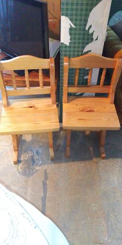 2 solid wooden chairs