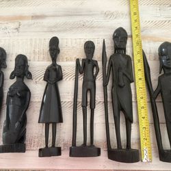 Set includes 3 men and 3 women Carved wood produced in East Africa 