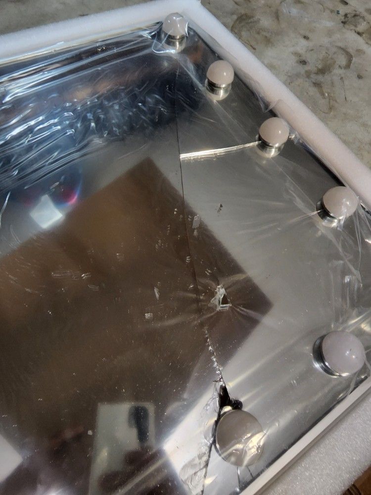 Broken Vanity Mirror