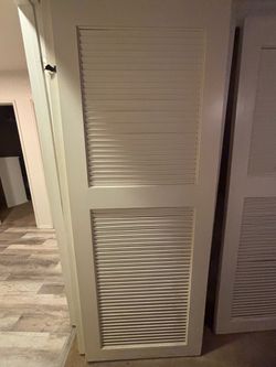 White Wooden Shutter Closet Doors
