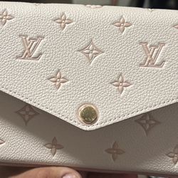 Louis Vuitton Pochette Félicie in Monogram Empreinte Leather