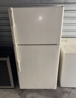 White GE Refrigerator And Freezer