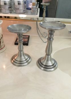 Two candle holders